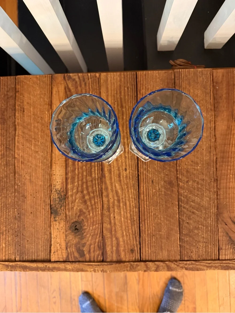 Pair of vintage HOMCO blue optic swirl votive holders with clear glass base